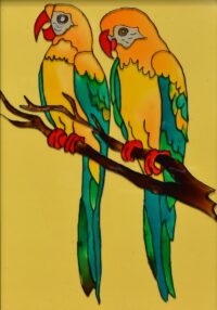 Parrots on twig